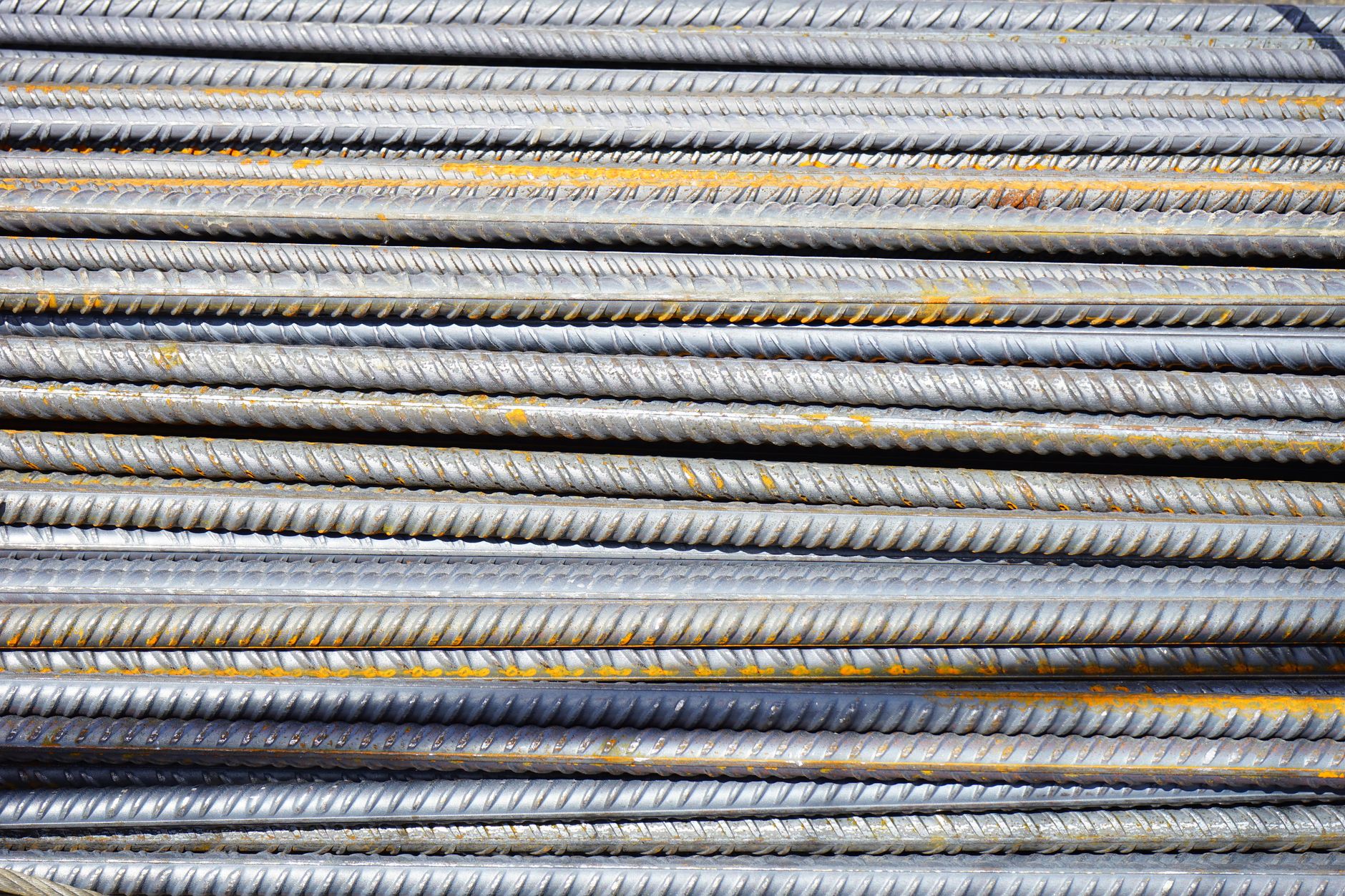 Aerial black and white view of a construction site rebar foundation framework