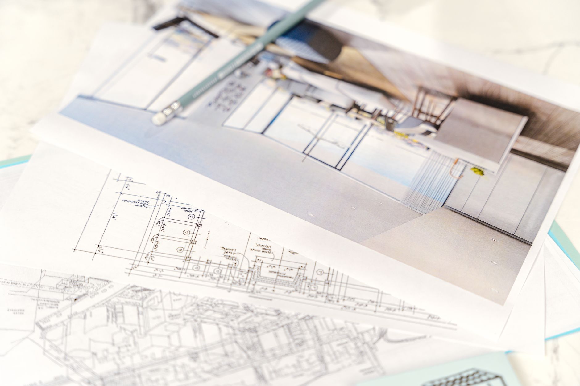 Architectural drafting table with blueprints, drawing tools, and models